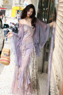 Street style view of the Vogsion lavender floral ruffle dress and matching sheer shrug.