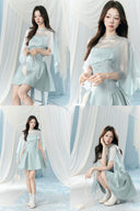 Vogsion Henley Slinky Drape Pearl Cape Mini & Maxi Dress in Light Blue worn by real Vogsion customer – authentic 2026 cape dress trend with pearl embellishments