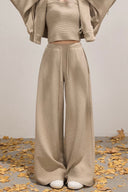 Casual beige knitwear outfit, oversized hoodie jacket, ribbed sleeveless crop top and wide leg trousers
