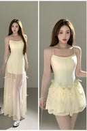 A 3-in-1 convertible bow detail dress for women, designed with built-in bra pads for comfort, shown styled as a maxi gown for resort vacations and evening parties.