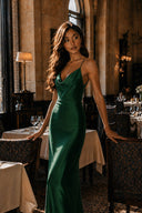 Emerald Green wedding guest dress by Vogsion with adjustable straps and an elegant floor-length skirt
