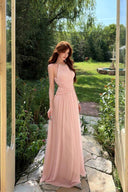 VOGSION Light Pink pearl halter A-line maxi dress in a garden