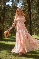 VOGSION Rosalie blush pink floral appliqué ruffle maxi dress outdoors