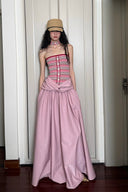 Vogsion Thalassa Striped Strapless Corset Maxi Dress – real customer wearing striped corset top and pink velvet maxi skirt in elegant summer resort outfit, 2026 beach vacation style with global fast shipping
