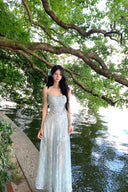 Vogsion Liora Ethereal Blue Floral Chiffon Maxi Dress worn by real everyday customer not professional model in scenic lakeside setting fairy core cottagecore style sheer summer maxi dress 2026 trend