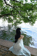 Vogsion Liora Ethereal Blue Floral Chiffon Maxi Dress worn by real everyday customer not professional model in scenic lakeside setting fairy core cottagecore style sheer summer maxi dress 2026 trend