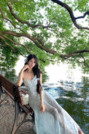 Vogsion Liora Ethereal Blue Floral Chiffon Maxi Dress worn by real everyday customer not professional model in scenic lakeside setting fairy core cottagecore style sheer summer maxi dress 2026 trend