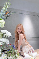 Vogsion Alchemy Beaded Mini Dress in Cream Multi Floral worn by a customer, showing the silk-linen fabric and corset bodice detail