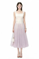    Vogsion Moonlit Lavender Petal lined lavender tulle midi dress with ivory textured bodice, square neckline, and pearl accessories
