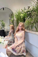 Vogsion Alchemy Beaded Mini Dress in Cream Multi Floral worn by a customer, showing the silk-linen fabric and corset bodice detail