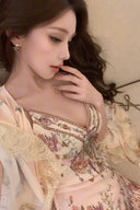 Woman wearing a Vogsion Adorned in Aranjuez Bias Cut Slipdress, posing indoors.