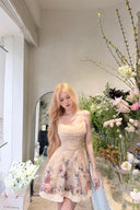 Vogsion Alchemy Beaded Mini Dress in Cream Multi Floral worn by a customer, showing the silk-linen fabric and corset bodice detail