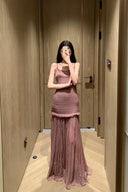 Vogsion OUDE 100% Silk Smocked Pleated Maxi Dress in Smoke Lavender or Soft Pink – real Vogsion customer wearing elegant spaghetti strap silk maxi with smocked bodice, ruffle trim and flowing pleated skirt, global fast shipping