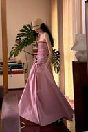 Vogsion Thalassa Striped Strapless Corset Maxi Dress – real customer wearing striped corset top and pink velvet maxi skirt in elegant summer resort outfit, 2026 beach vacation style with global fast shipping