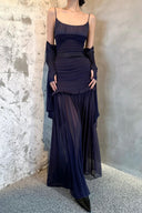 Vogsion OUDE 100% Silk Smocked Pleated Maxi Dress in Smoke Lavender or Soft Pink – real Vogsion customer wearing elegant spaghetti strap silk maxi with smocked bodice, ruffle trim and flowing pleated skirt, global fast shipping