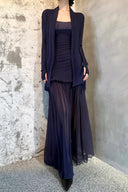 Vogsion OUDE 100% Silk Smocked Pleated Maxi Dress in Smoke Lavender or Soft Pink – real Vogsion customer wearing elegant spaghetti strap silk maxi with smocked bodice, ruffle trim and flowing pleated skirt, global fast shipping