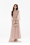 Vogsion wedding guest chiffon maxi dress blush pink ruffle detail side view