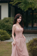 Vogsion blush pink lace corset tulle maxi dress outdoor garden photo