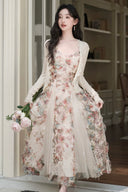 Vogsion Elysian Rose floral maxi dress worn by customer in a sunlit garden