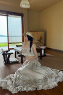 Vogsion LaceMade-Inspired Cottagecore Vintage Lace Ruffled Two-Piece Set in beige worn by real customer in elegant lakeside villa – romantic crop top and tiered maxi skirt 2026 coquette princess core