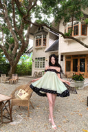 Vogsion Velvandis Off Shoulder Dot Mini Dress sage green polka dot worn by real customer not model - trending 2026 summer vacation dress with black polka dots and off shoulder style