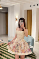 Vogsion Alchemy Beaded Mini Dress in Cream Multi Floral worn by a customer, showing the silk-linen fabric and corset bodice detail