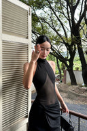 Vogsion Noir Eclipse Sheer Halter Maxi Dress black sheer panel elegant evening gown for formal events

