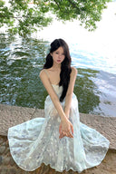 Vogsion Liora Ethereal Blue Floral Chiffon Maxi Dress worn by real everyday customer not professional model in scenic lakeside setting fairy core cottagecore style sheer summer maxi dress 2026 trend