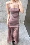 Vogsion OUDE 100% Silk Smocked Pleated Maxi Dress in Smoke Lavender or Soft Pink – real Vogsion customer wearing elegant spaghetti strap silk maxi with smocked bodice, ruffle trim and flowing pleated skirt, global fast shipping