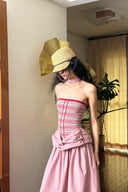 Vogsion Thalassa Striped Strapless Corset Maxi Dress – real customer wearing striped corset top and pink velvet maxi skirt in elegant summer resort outfit, 2026 beach vacation style with global fast shipping