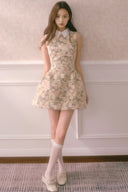 Soft girl outfit inspiration — Vogsion floral vintage mini dress in pastel tones under dreamy natural light