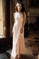 Blush pink lace hem midi dress for weddings featuring an elegant sleeveless silhouette and feminine fit by VOGSION.