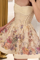 Vogsion Alchemy Beaded Mini Dress in Cream Multi Floral worn by a customer, showing the silk-linen fabric and corset bodice detail