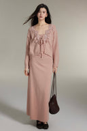 Vogsion powder pink lace trim knit cardigan and maxi skirt set on real customer, cropped open-front cardigan with floral lace appliqué and tie bow over cami, high-waisted ribbed maxi skirt, feminine 2026 co-ord outfit, global fast shipping