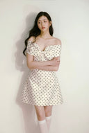 Close-up of front bow detail on Vogsion polka dot vintage mini dress, perfect for date night or afternoon tea