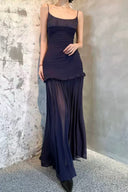 Vogsion OUDE 100% Silk Smocked Pleated Maxi Dress in Smoke Lavender or Soft Pink – real Vogsion customer wearing elegant spaghetti strap silk maxi with smocked bodice, ruffle trim and flowing pleated skirt, global fast shipping