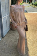 Close-up of VOGSION Sahara Mirage ruched waist off shoulder maxi dress in nude beige with elegant draping