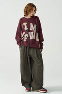 Vogsion “IM YF/WG” Hand-Embroidered Statement Knit Sweater