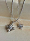 Detail photo of Vogsion Fleur d’Iris CZ pendant necklace