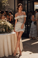 Floral-inspired grey chiffon mini dress for a wedding after-party or formal celebration