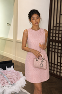 Front view of petite pink tweed mini dress for short women with luxury-inspired silhouette