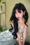 Vogsion Sieren Pistachio Floral Devoré Jacquard Maxi Gown featuring an internal corset bodice and lace-up back, styled for a luxury destination wedding.