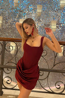 Vogsion burgundy corset mini dress with ruched draped skirt — customer pose close-up