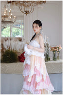 Vogsion Seraphina tiered lace maxi dress in pastel pink and cream, featuring layered ruffles and delicate lace trim for a romantic, high-fashion princesscore look.
