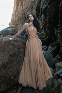 Vogsion Spring Oath Embroidered Tulle Gown in champagne nude featuring floral corset bodice and flowing pleated tulle skirt, styled for destination wedding and evening gala elegance