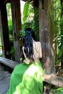 Vogsion Lime Green Maxi Dress for Women 2026 Summer - Real customer wearing flowy spaghetti strap crisscross backless satin vacation beach sundress in tropical garden, not professional model photos