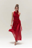 Vogsion Rouge Bloom Dress – elegant red chiffon halter neck dress with rose flower detail, flowy skirt and feminine silhouette perfect for evening or event occasions.