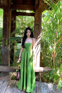 Vogsion Lime Green Maxi Dress for Women 2026 Summer - Real customer wearing flowy spaghetti strap crisscross backless satin vacation beach sundress in tropical garden, not professional model photos