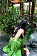 Vogsion Lime Green Maxi Dress for Women 2026 Summer - Real customer wearing flowy spaghetti strap crisscross backless satin vacation beach sundress in tropical garden, not professional model photos