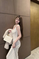 Vogsion white/ivory lace corset column gown outdoors, full length eventwear look